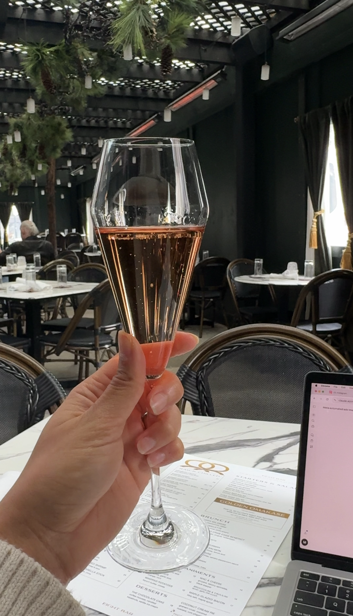 A champagne glass with rose